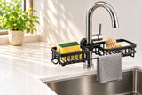 Double rack in a bright kitchen with a sponge, brush, soap and cloth